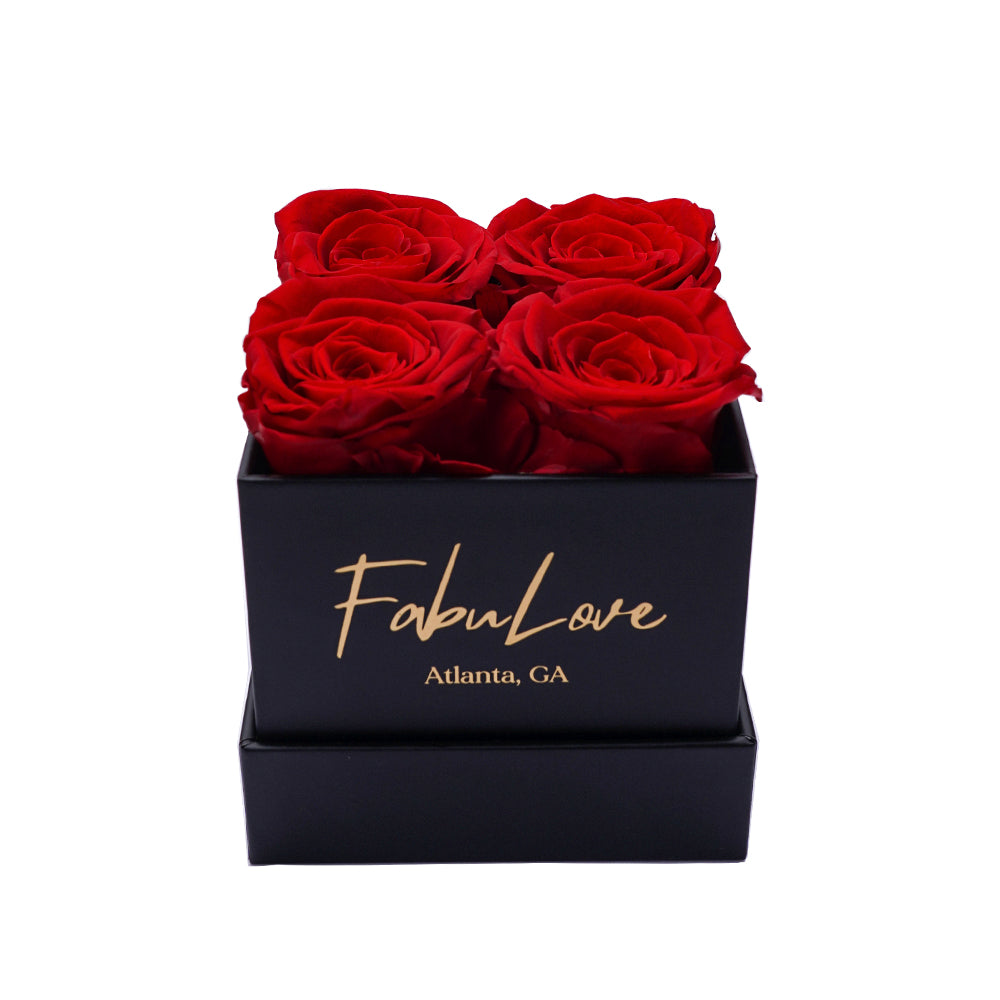 Boeket met Vier Eeuwige Rozen in Cadeaubox