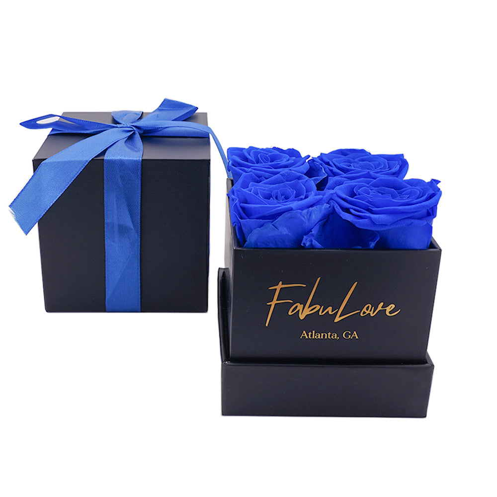 Boeket met Vier Eeuwige Rozen in Cadeaubox
