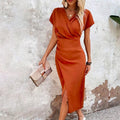 Oranje midi jurk met v-hals – Ruby