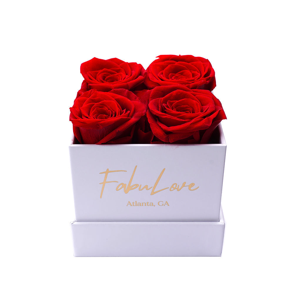 Boeket met Vier Eeuwige Rozen in Cadeaubox