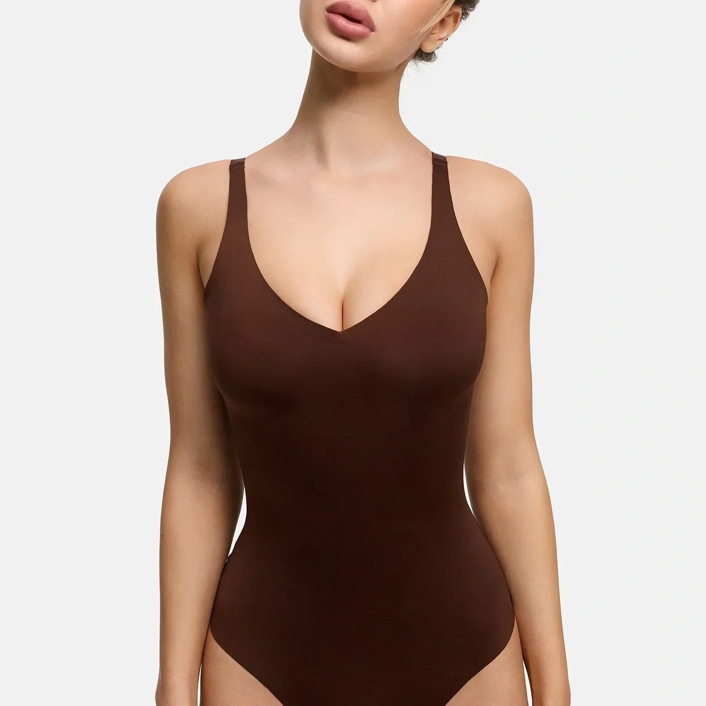 Glanzende shaping bodysuit met string