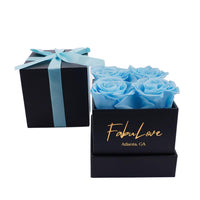 Boeket met Vier Eeuwige Rozen in Cadeaubox