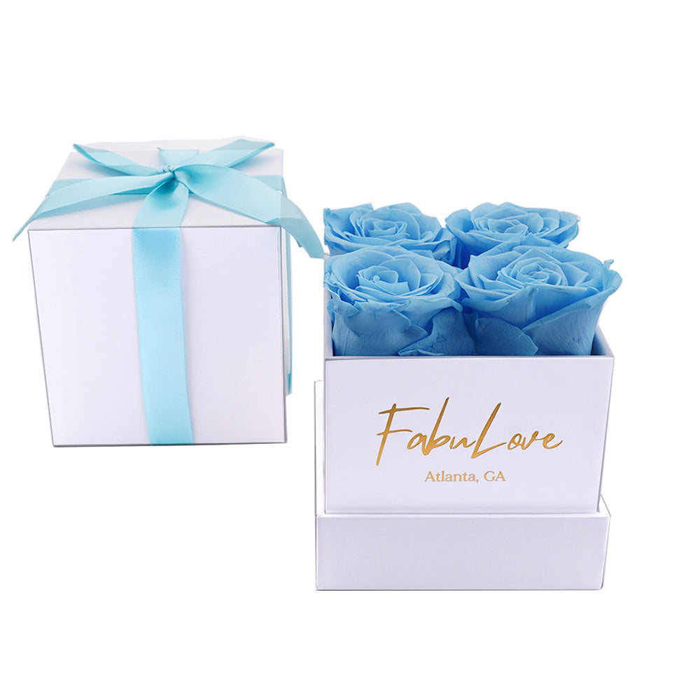 Boeket met Vier Eeuwige Rozen in Cadeaubox